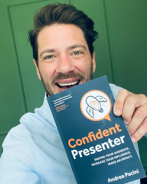 Reader 1 selfie holding Confident Presenter book in front of him